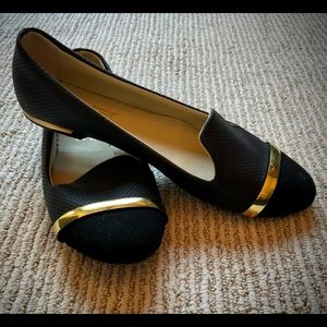 Black flats with gold trim